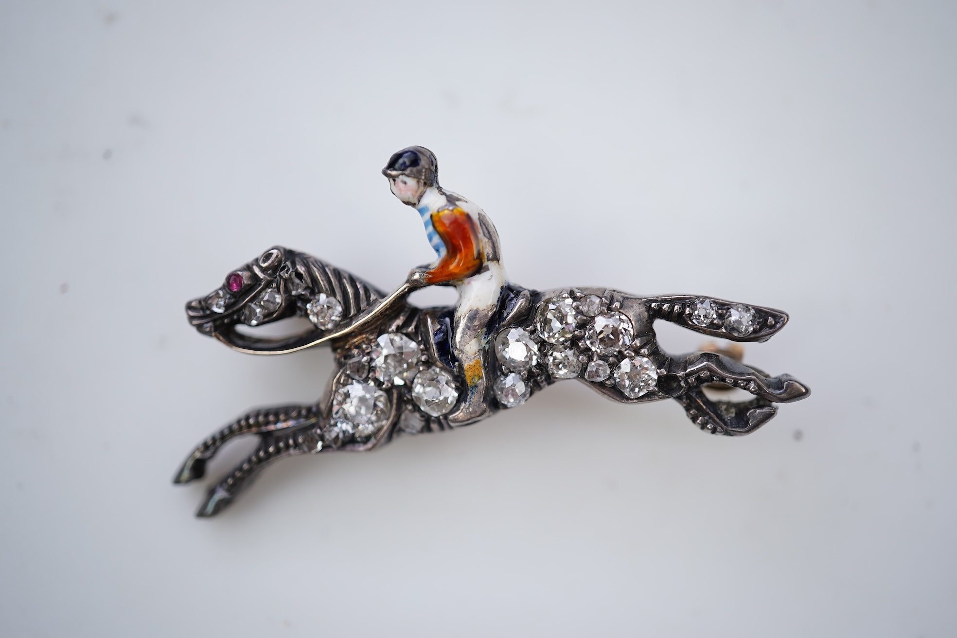 A diamond and enamel novelty brooch, circa 1900